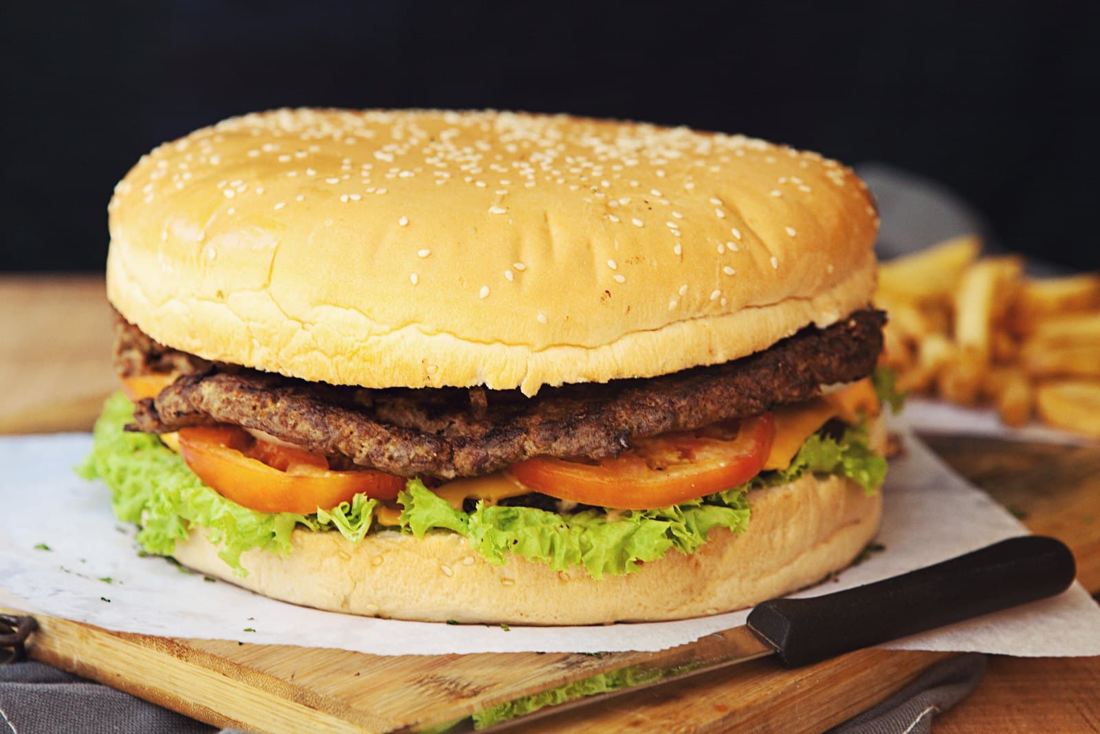 Big Bang Burger — real serving, warm light